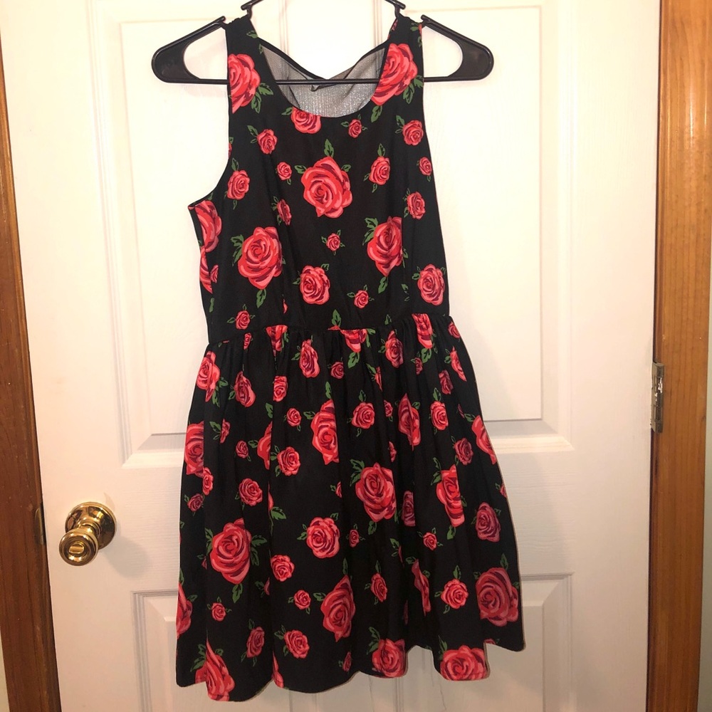 Black dress with red floral design